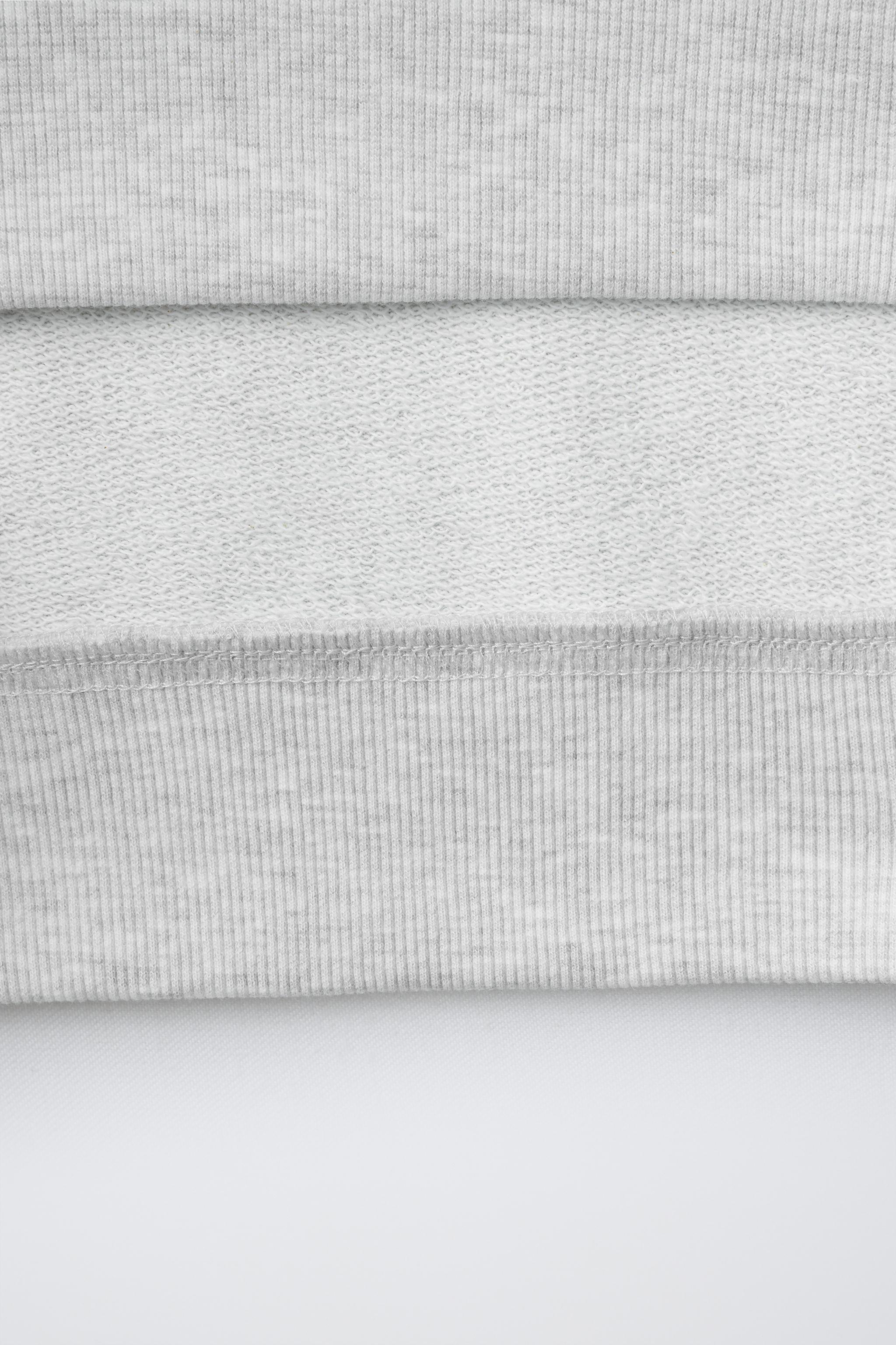SWEAT À IMPRIMÉ OURS ET INSCRIPTION